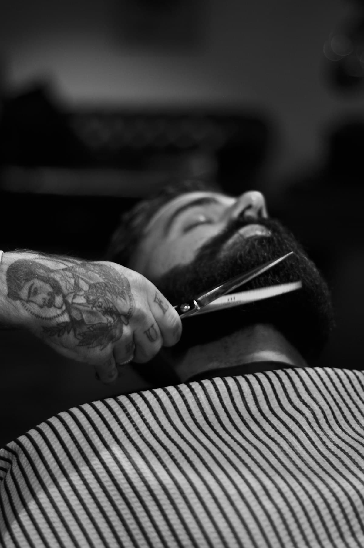 Beard being trimmed with scissors